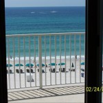 View from balcony. Free Beach service paid by owners March 1- October 31. You will have use of an umbrella and 2 padded chaise lounges each day of your stay when you mention our Inside Panama City Beach Website! - Ocean Villa 504