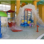 Kids LOVE the water play area with slides and splash bucket! - Splash