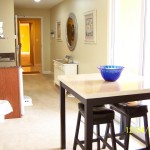 3rd bedroom lockout with table, stool, and mini kitchen. - Splash 1901E