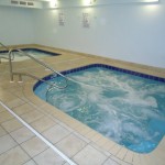 Adults-only indoor roman spas in the exercise room - Tidewater 1802