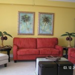Living room with ocean views, 2 sofas, chaise lounge, and kids chair - Tidewater 1802