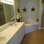 Master bathroom with double vanity, garden tub, and shower - Tidewater 401
